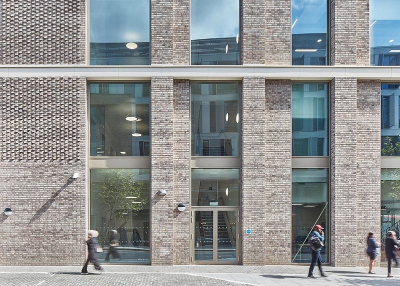 The brickwork facade with protruding header details at Colindale Offices in Barnet.