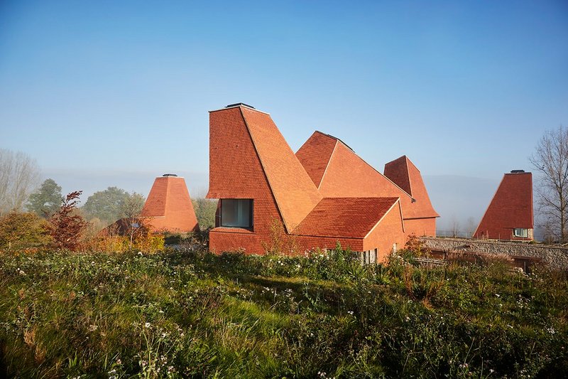 Spacehub's landscaping at Caring Wood, chosen carefully to blend with the colours of the roof tiles.