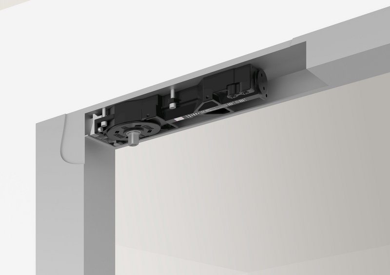 The DC6113 slimline transom door closer: Striking the balance between the closing of a door to keep a building safe and secure and making it accessible and inclusive to all.