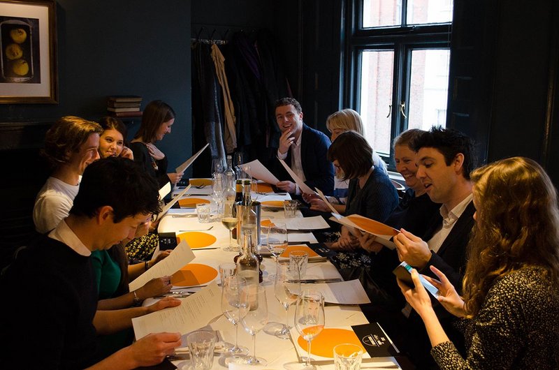 RIBA J Rising Stars 2017, studying for lunch. Around the table from bottom left: Ben Ridley, Tumpa Husna Yasmin Fellows, Matthew Wilkinson, Nathalie Baxter, Anna Howell, Declan Sharkey, Angharad Palmer, Úna Breathnach-Hifearnáin, Eleanor Young (chair, RIBA Journal), Paul Ruff, Isabelle Priest (RIBA Journal).