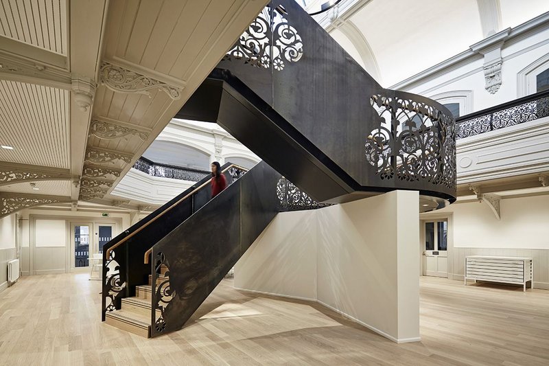 The new staircase turns the two floors of the architecture school into a world of its own.