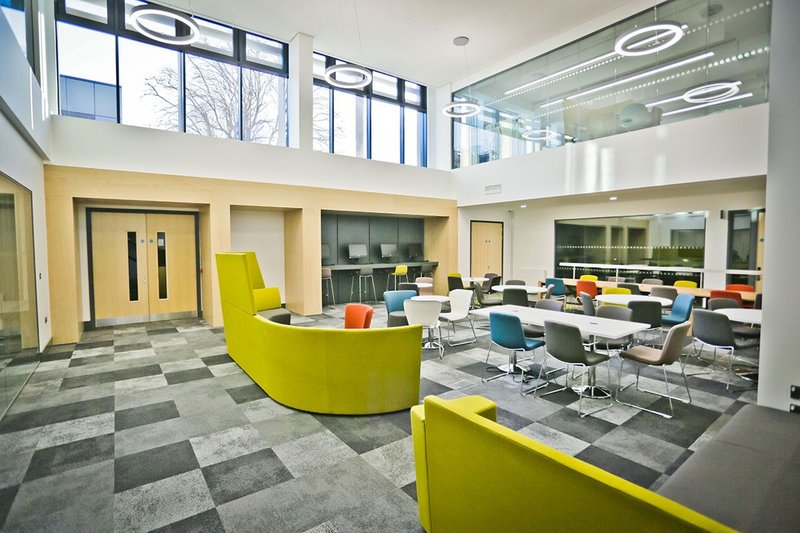 Interface Composure modular flooring in a breakout space in the Clerici building at Oxford Brookes University.