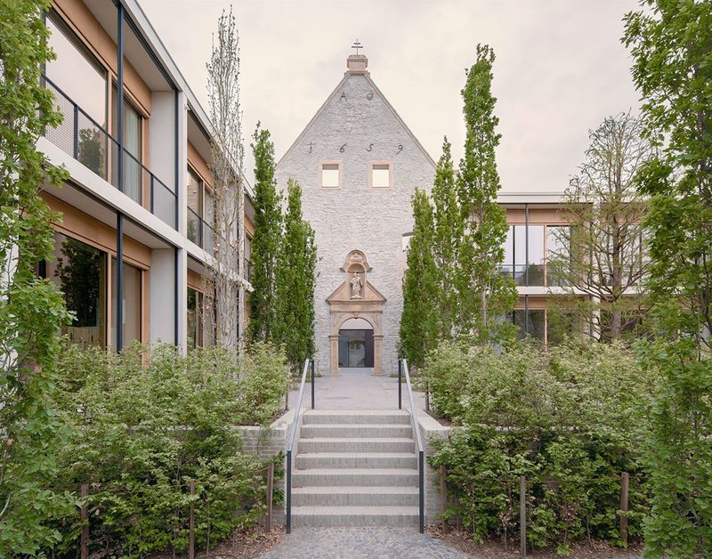 Jacoby Studios, Paderborn, Germany, by David Chipperfield Architects. Behind the chapel façade its ‘interior’ has been transformed into an exterior space, serving as an entrance courtyard.