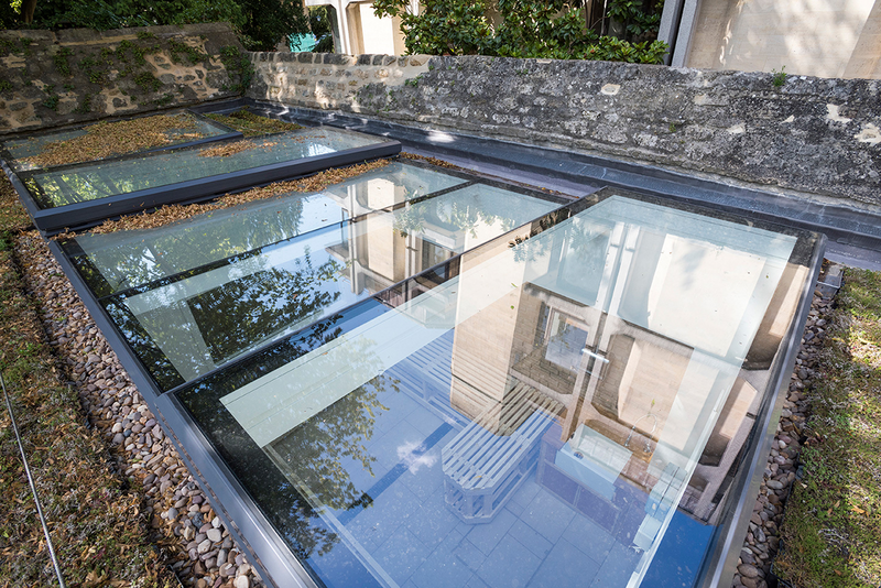 Sunsquare rooflights in the gardens of St John's College Oxford. A large part-fixed, part-opening rooflight allows light into darker areas.