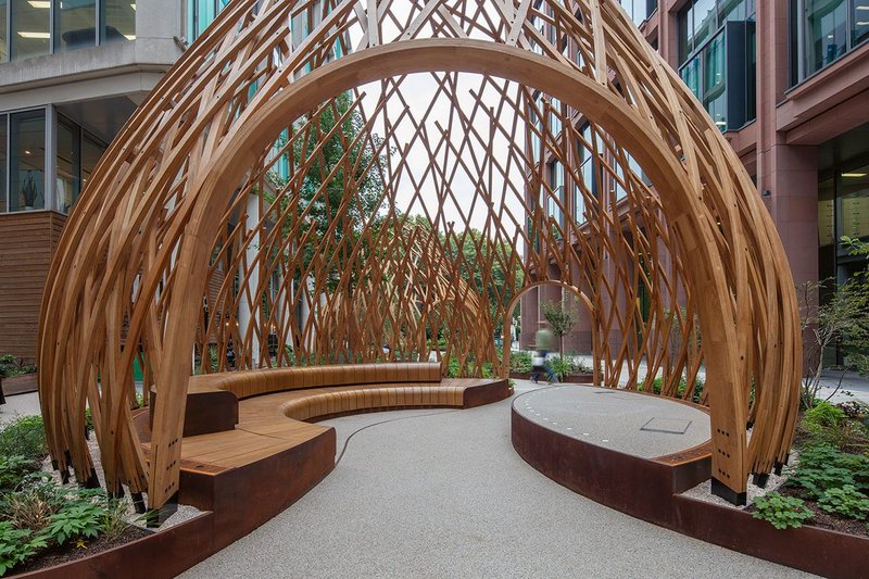 The pavilions seem to pick up on the timber latticework of an English garden, reinterpreted in a contemporary way.