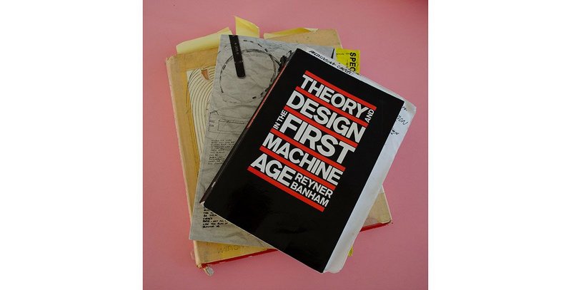 Heavily drawn on and used, Peter Cook’s selected titles are annotated, marked with post-its and interspersed with pages of notes.