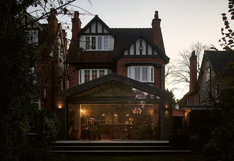 The Victorian facade a full width extension makes the most of the mature garden.