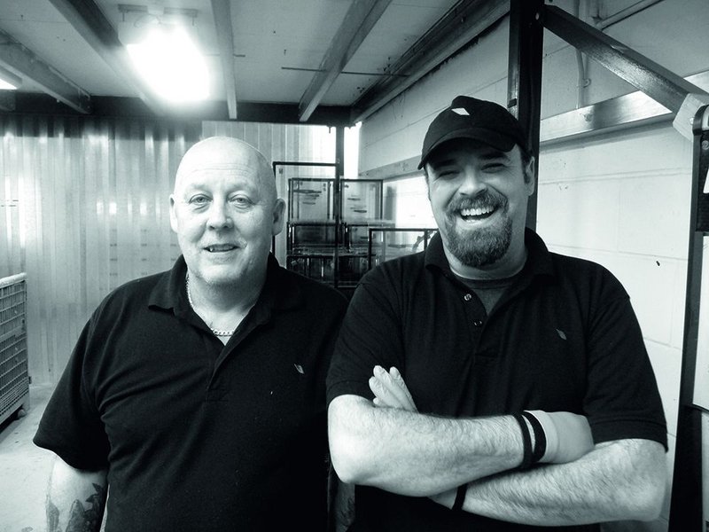 Rooflight Company employees Phil Young and Steve Lewsey make up and check the integrity of glazing  units built in the factory.