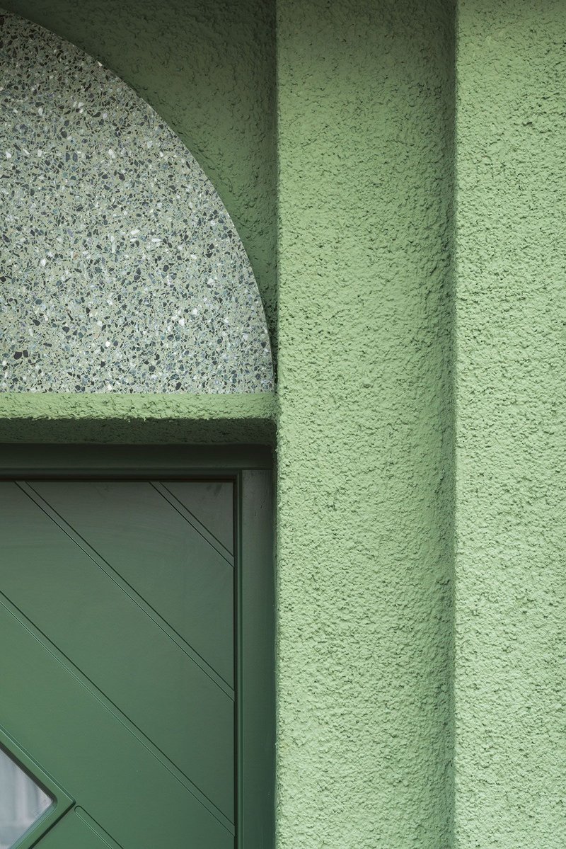 Green on green on green: geometric entrance door detail