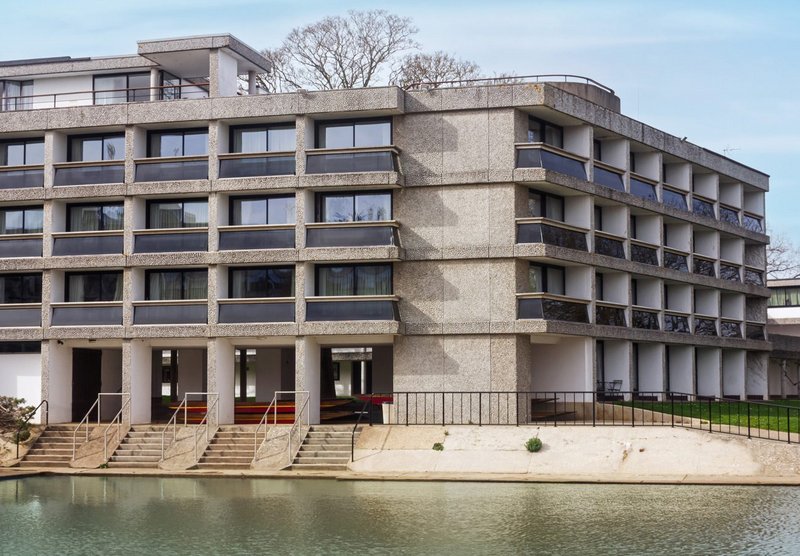 Wolfson College C Block across the harbour.