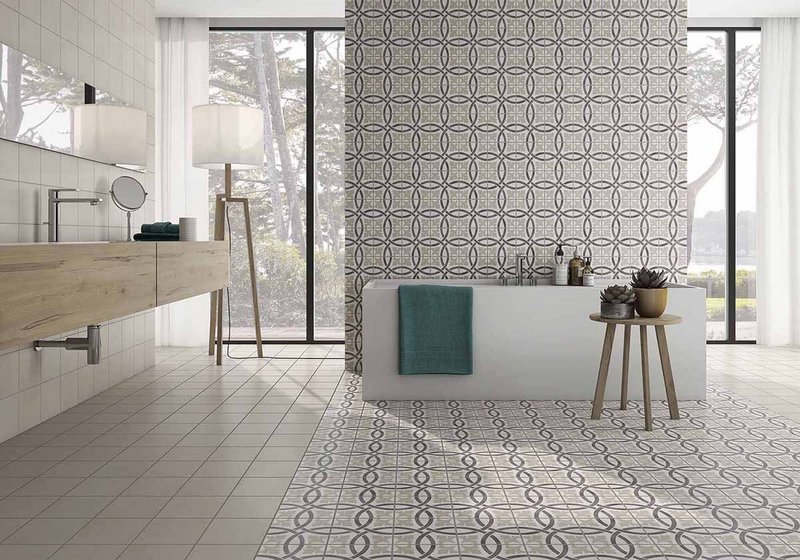 Sitges by Saloni, Pobles series. Porcelain tiles for wall and floor in a choice of five designs, including Sitges (shown), can be combined with plain tiles in Beige, Blanco, Grafito, Gris and Iris to create a custom look. Format 18.5x18.5cm.