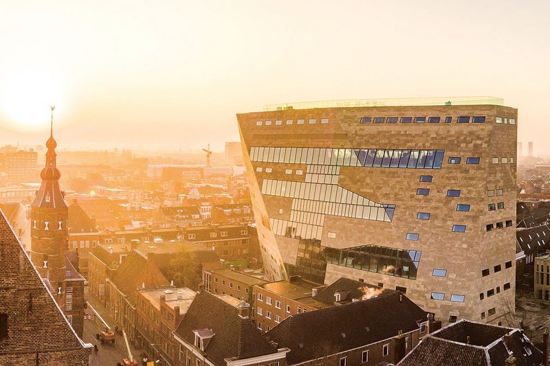 The new Forum sails into the city past the Martinikerk tower. It replaces a huddle of post-war building, including a multi-storey car park.