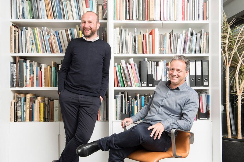 Stuart Cade (left) and Gavin Miller in Rick Mather’s old office, now a library.