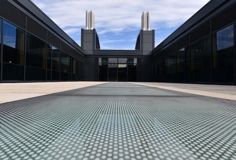 Xtralite at the University of Cambridge Civil Engineering Building. Glass walk-on rooflights fit flush to the exterior roof surface and are supplied in toughened, laminated glass enabling them to be walked on.