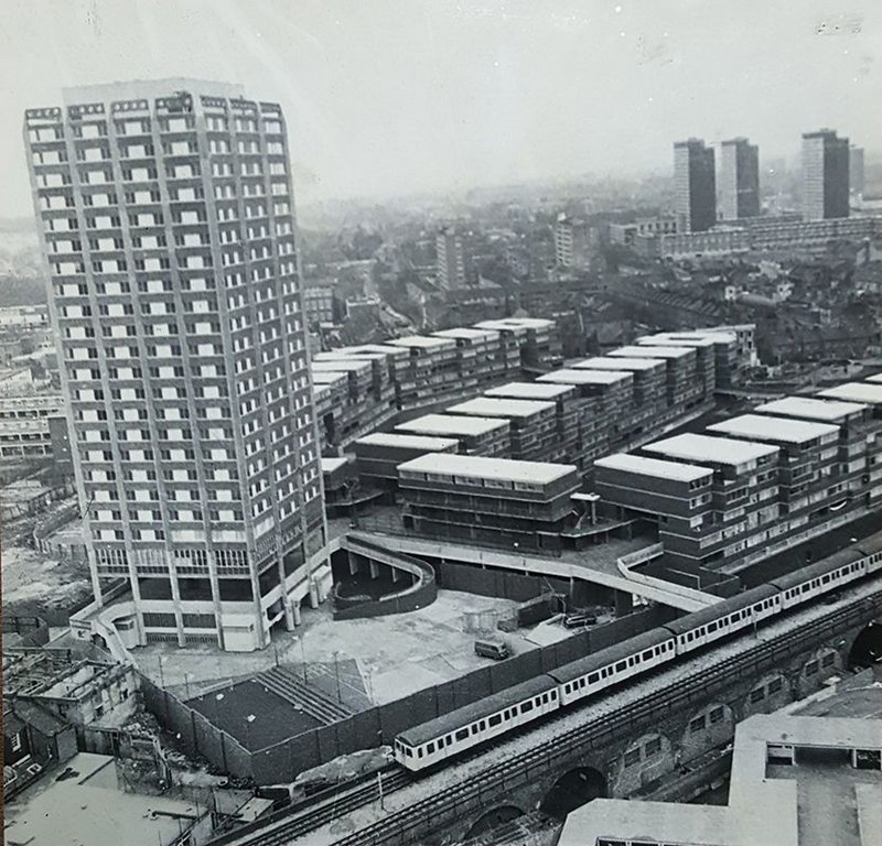 Grenfell Tower shortly after construction, with its low rise finger blocks behind.