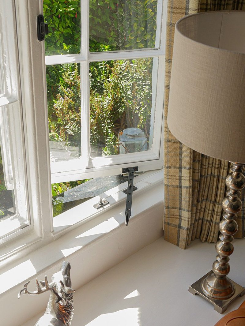 The CosyGlazing secondary glazing system is designed to be 'invisible' to preserve period features while cutting heat loss by 75%