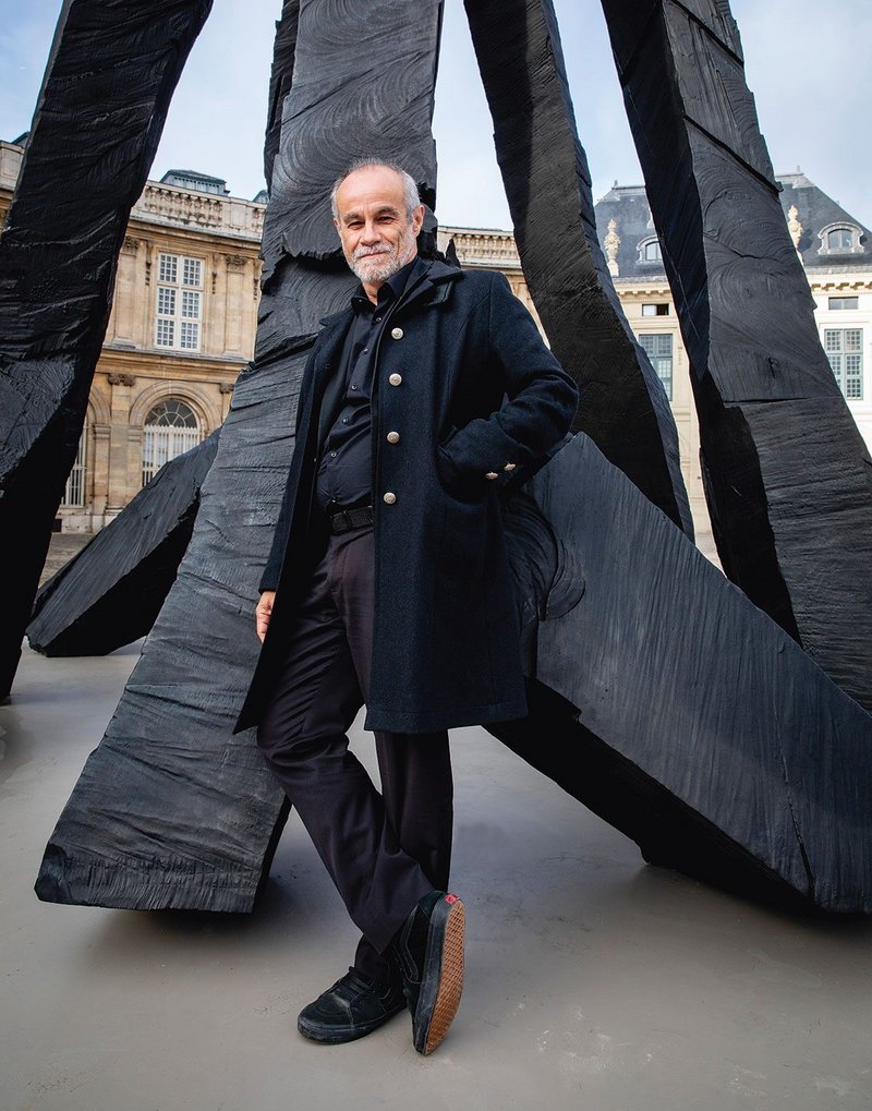 Professor Carlos Moreno in front of the ‘Zero Dom’ sculpture by German artist Georg Baselitz, outside the Academie Francaise near his Paris home.