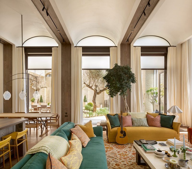 The barrel-vaulted ceiling in the main living space. The vaults are set slightly apart for services to run between.