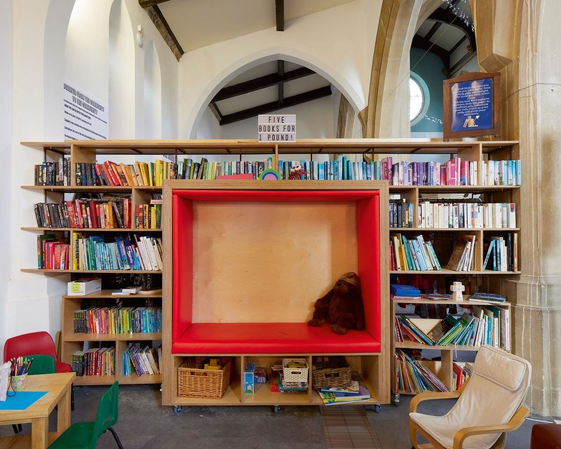 Snug place for kids' reading. Like most of the fittings it can be wheeled around.