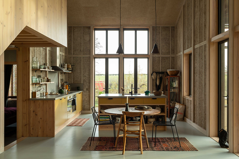 Flat House, a low embodied carbon house in Cambridgeshire designed by Practice Architecture. The project prototyped prefabricated hemp fibre cladding.