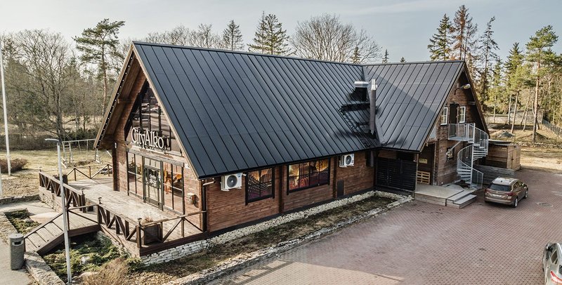 Modern convenience store featuring a 21.19 kWp Roofit. Solar roof, completed in 2024, Estonia.