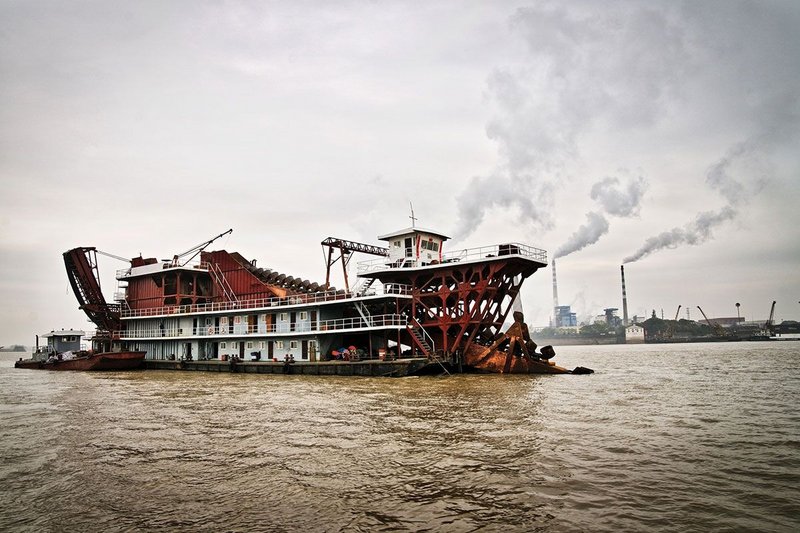 Sand dredging boats on Dongting Lake, China.