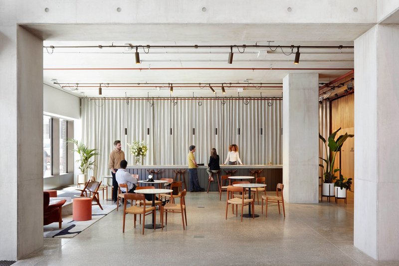 The cafe space is an exercise in pared-back minimalism.