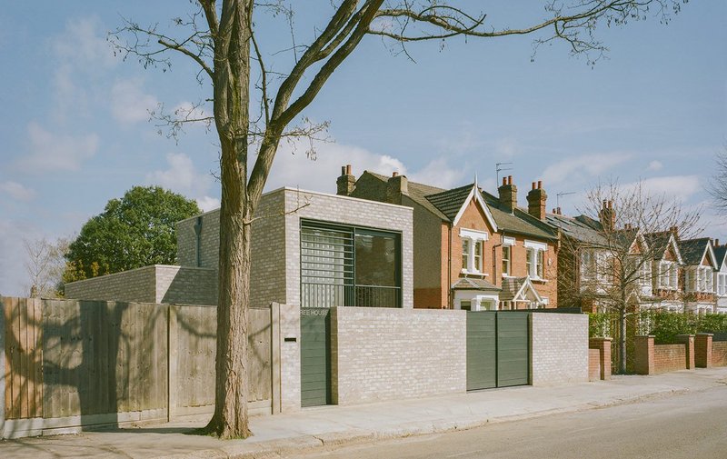 Fletcher Crane's Tree House is 'stitched assertively into the street scenography'.