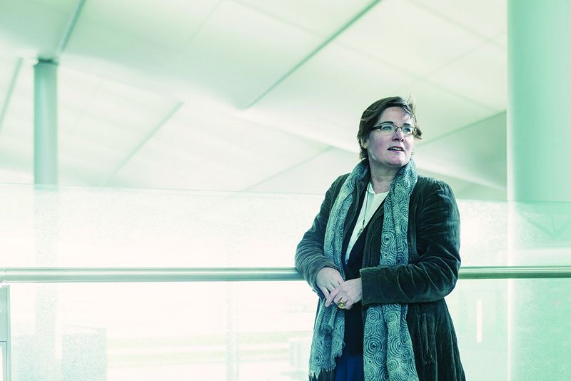 Karen Rogers on the departure level walkway of the cavernous ‘transition zone’ into Heathrow’s new Terminal 2.   The fabric covered steel structure forms a translucent roof that runs through to the depths of the airside baggage hall.