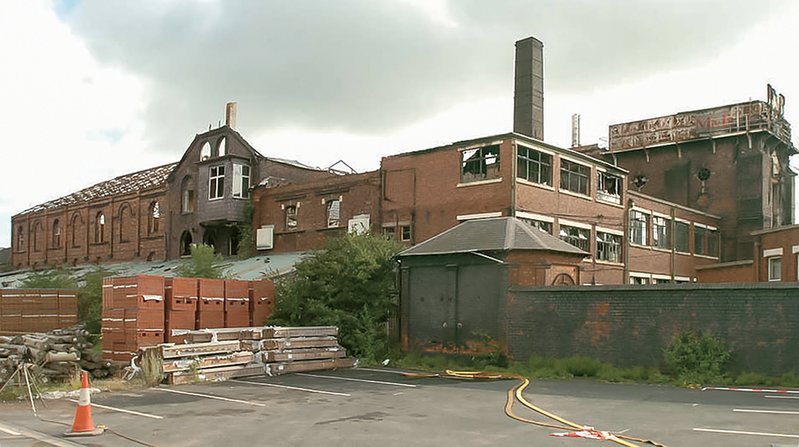 Image of ruined building caption: The Springfield brewery as handed over to Associated Architects.