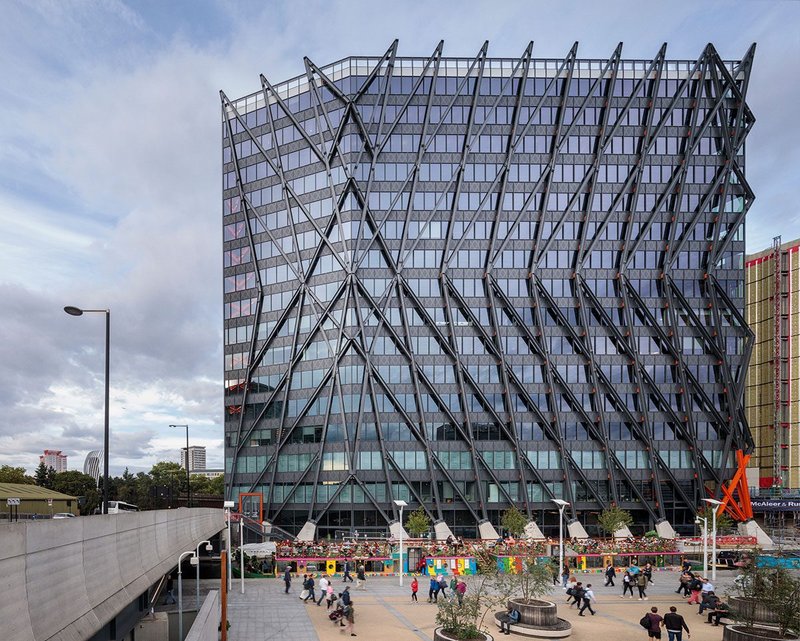 The south, principal elevation of the Brunel Building lords it dramatically over the new public canalside towpath.