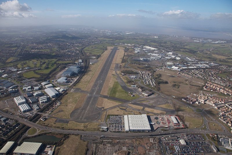 The airfield from above, Brabazon hangars to left (south). They sit near the peak of the slope which falls away 27m to the west and 15m to the east.