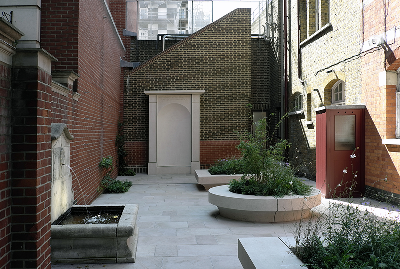 The remembrance garden salvages a strip of land to the side of Westminster Coroner's Court.