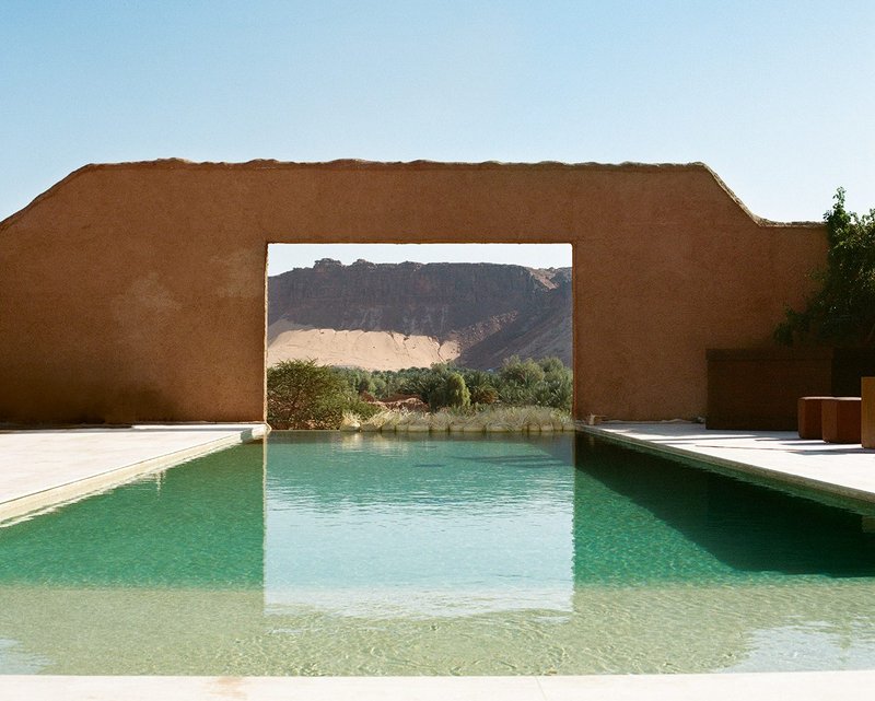 An AlUla hotel by Shahira Fahmy extends historic mud brick buildings in traditional materials, pointing to growing interest in earthen construction in which  rammed earth is key.