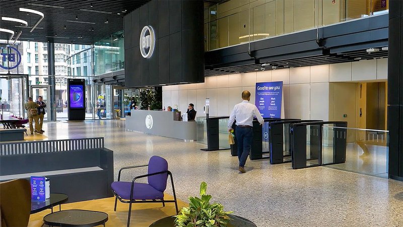 The new double-height lobby at One Braham: With 3,500 employees expected to pass through each day, an entrance that supported traffic while blending with the glazed facade was required.