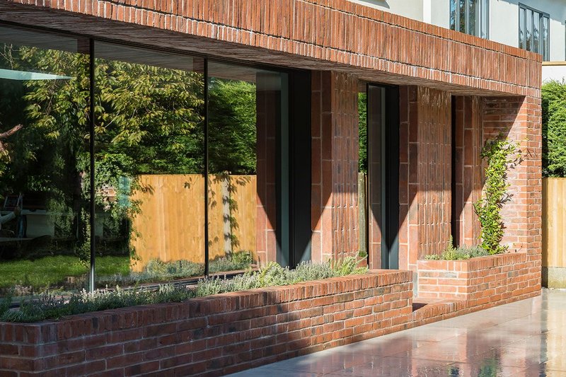 Brick House's rear extension, which combines vertical and horizontal bricks, as well as a wrapping facade.