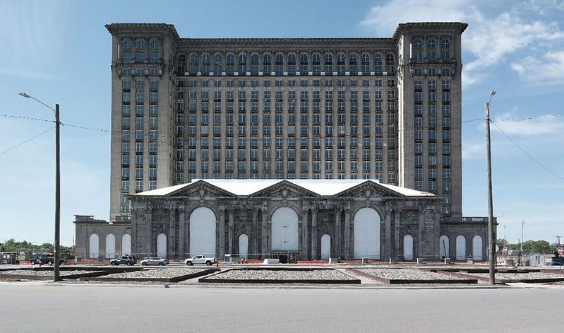 Michigan Central Station, still grand though crumbling with train shed at the base and offices above.