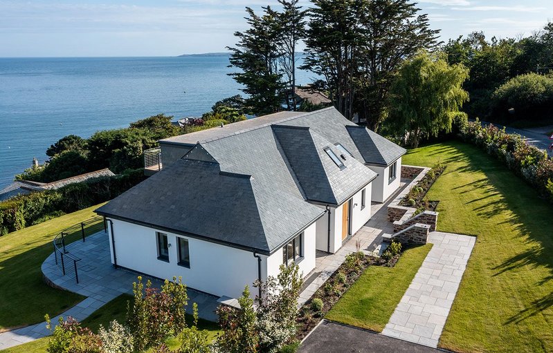 Standing firm; sitting pretty: SSQ Riverstone phyllite roofing at the new-build in St Mawes, Cornwall.