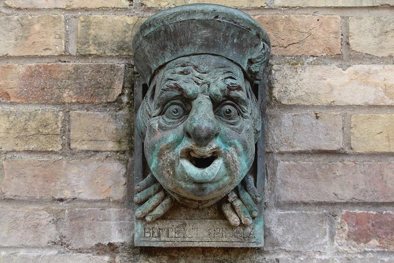 A modern gargoyle of Benedict Spinola set into the river wall of ‘Quayside’, directly opposite the college’s bank