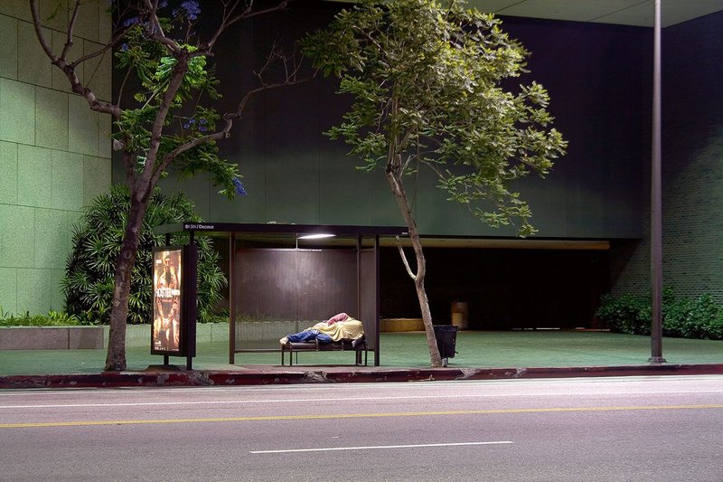 A 2006 image from J Wesley Brown’s series The Riders illustrates the disjunction between the intended and actual use of LA street furniture.