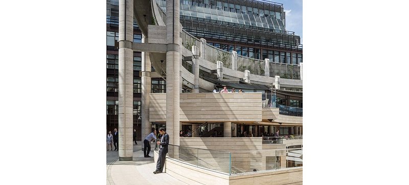 Broadgate Circus, designed as part of the wider Broadgate in the 1980s. The travertine centrepiece and spaces were reworked in 2015.