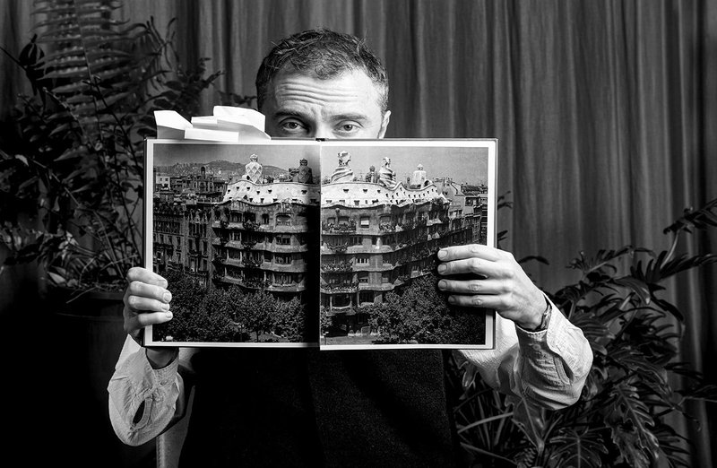 Thomas Heatherwick holds up a spread from Humanise - an antidote to the ‘blandemic’ of boring architecture.