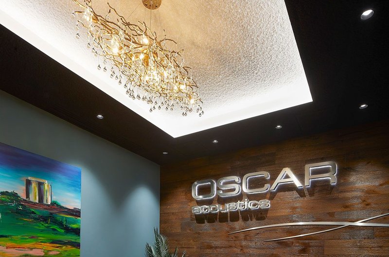 The Oscar Innovation Centre: SonaSpray K-13 Special acoustic ceiling spray in white in a coffer with SonaSpray fc in black on the underside using Oscar Evo-Blade.  Evo-Blade makes the 15mm of SonaSpray and the plasterboard look wafer-thin like a piece of paper.