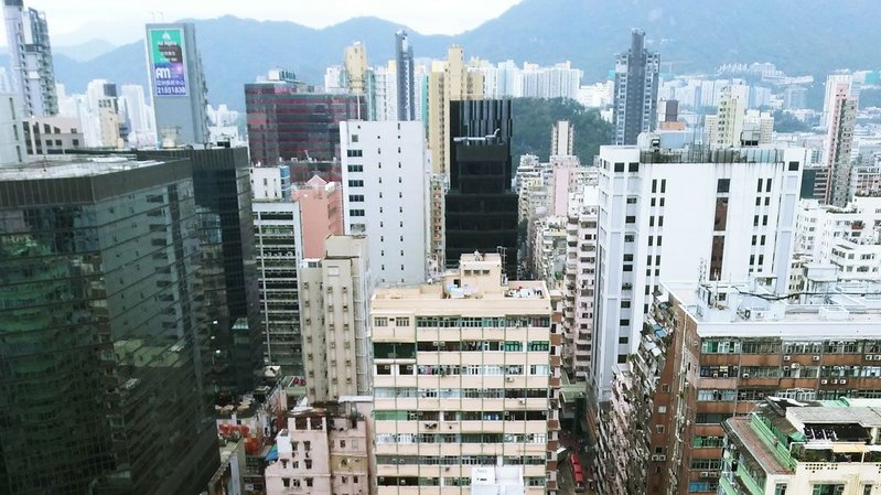 Cheek-by-jowl living’ in Mong Kok. The Mong Kok district of Hong Kong is often claimed to be one of the highest density neighbourhoods in the world at 130,000/km2 or 340,000 per square mile.