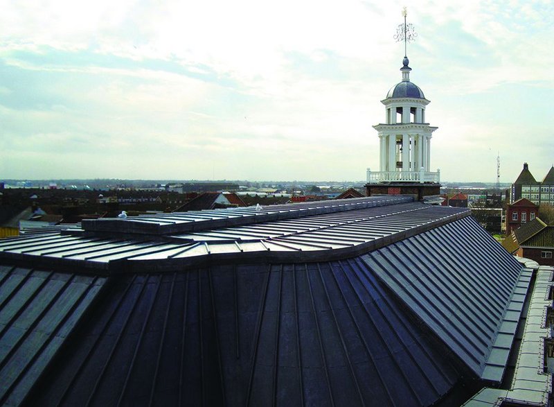 The roof of the old building has been completely renewed with leadwork replacing defective copper.