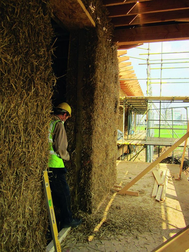 Straw bale wall under construction