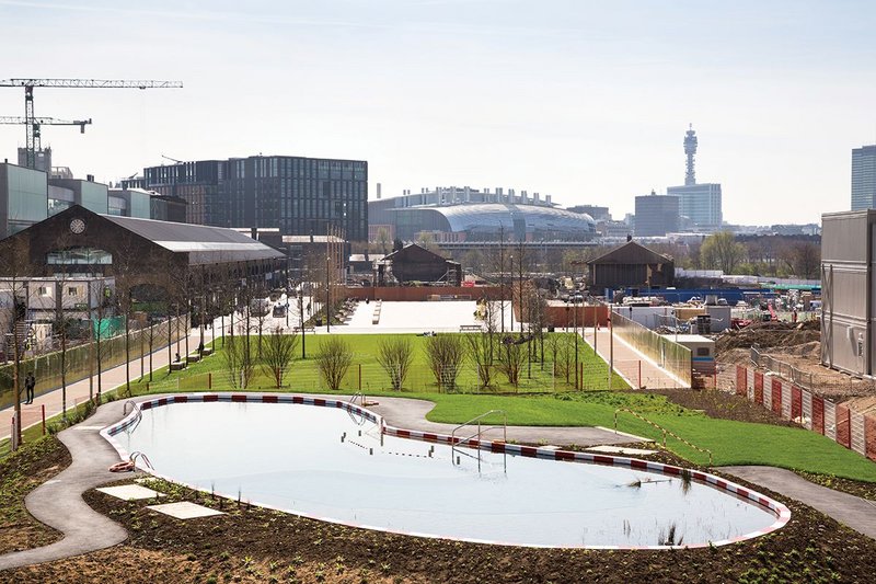 Looking south past Central St Martins to central London.  With lockers, changing cubicles  and kiosk, the natural pond installation is intended to entertain as well as educate.