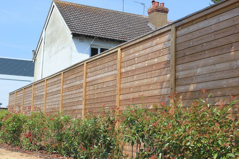 Jacksons' Jakoustic Reflective fencing uses planed timber boards to reflect noise.