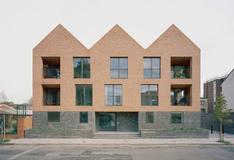 Three gables characterise the private housing block at Tori Ann Walk, with windows offset to the roof form.