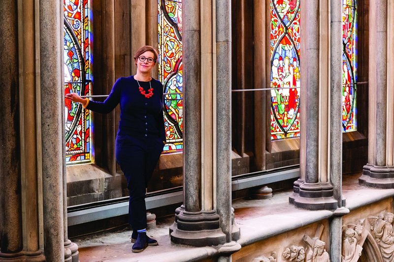 Camilla Finlay at Worcester Cathedral’s east window. As surveyor to the fabric she has the keys and codes for the hidden spaces.